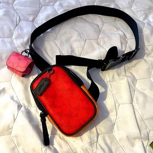 Coach Multifunction Phone Pack In Miami Red Blocked Signature Canvas